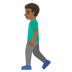 🚶🏾‍♂️ man walking: medium-dark skin tone display on Google